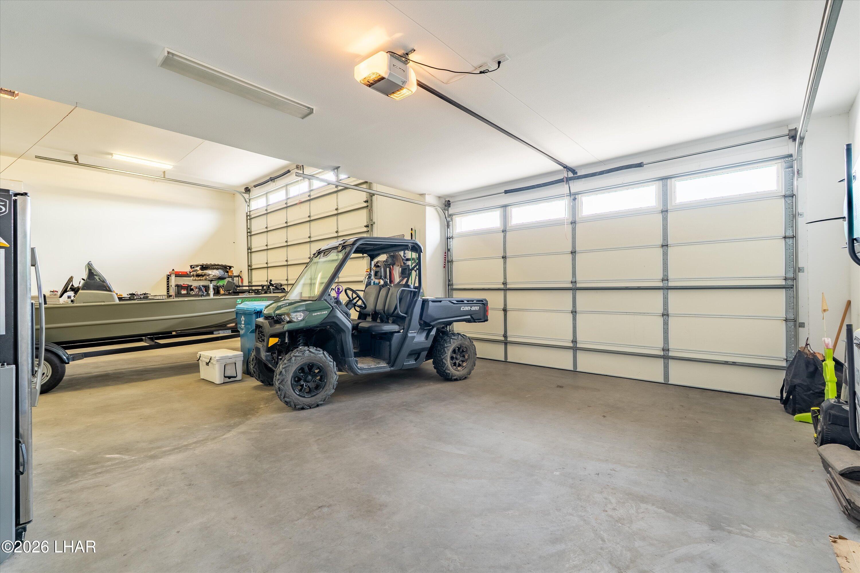 4667 North Juneberry Road Lake Havasu City, AZ 86404 - Photo 34 of 50 a view of a garage with furniture and a window