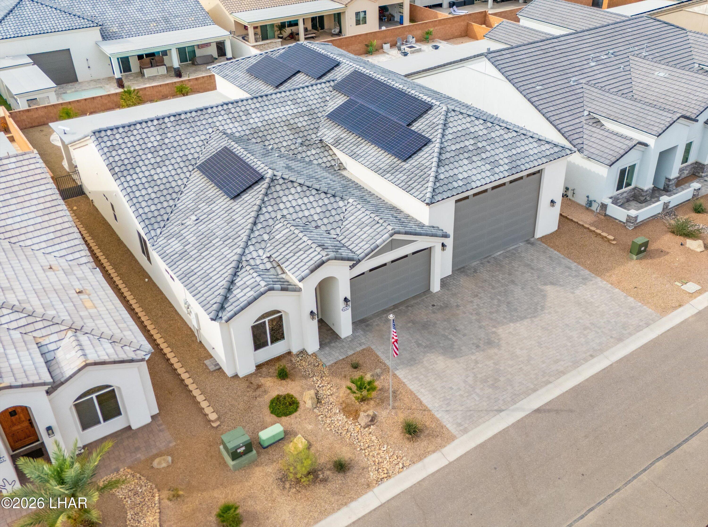 4667 North Juneberry Road Lake Havasu City, AZ 86404 - Photo 45 of 50 a aerial view of a house with roof deck