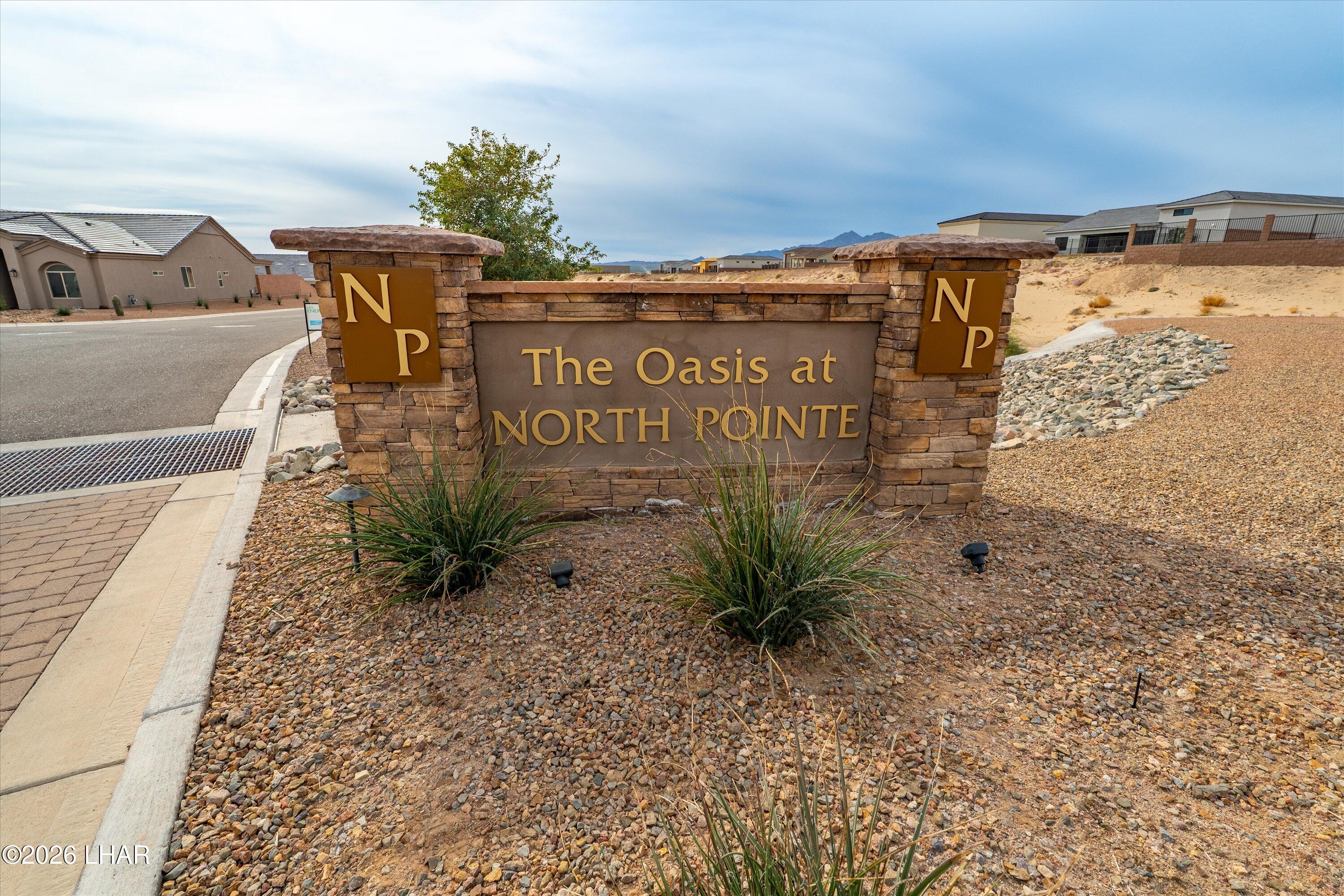 4667 North Juneberry Road Lake Havasu City, AZ 86404 - Photo 48 of 50 a sign on the side of a building