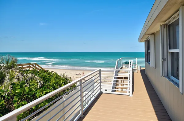 a view of living room with furniture and flat screen tv