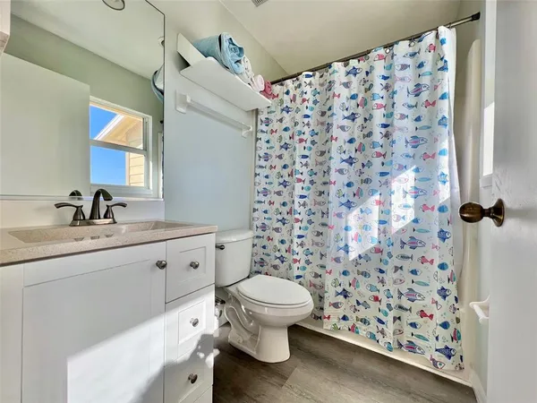 a view of balcony with furniture