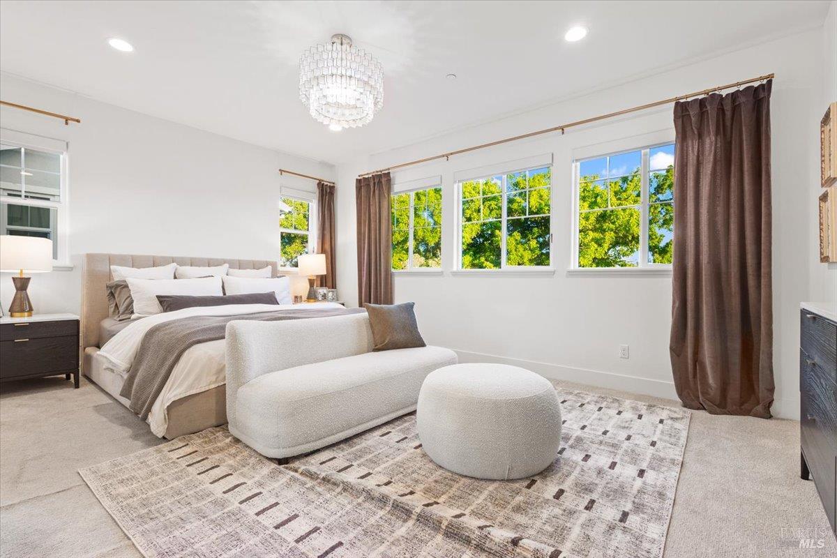 1469 Oak Circle Rohnert Park, CA 94928 - Photo 19 of 42 A Private Retreat The spacious primary suite offers a peaceful escape with generous proportions, designer finishes, and direct access to the spa-inspired bathroom and custom walk-in closet.