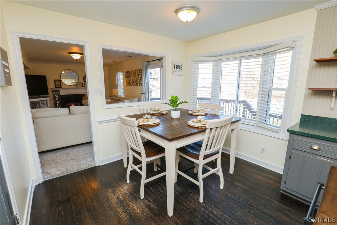 14025 Sagebrook Road Midlothian, VA 23112 - Photo 20 of 49 a view of a dining room with furniture and wooden floor