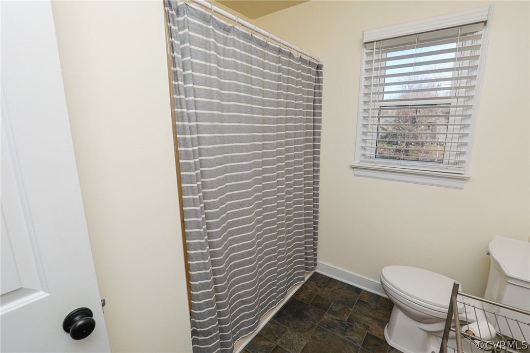 14025 Sagebrook Road Midlothian, VA 23112 - Photo 37 of 49 a bathroom with a toilet and a shower