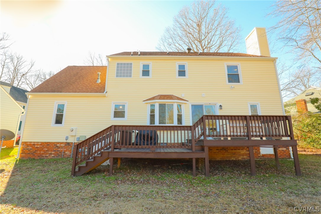 14025 Sagebrook Road Midlothian, VA 23112 - Photo 42 of 49 a view of a house with a yard and deck