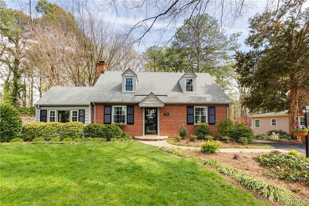 1015 Ridge Top Road Henrico, VA 23229 - Photo 1 of 50 Lovely landscaping enhances this charming brick cape with two-story rear addition