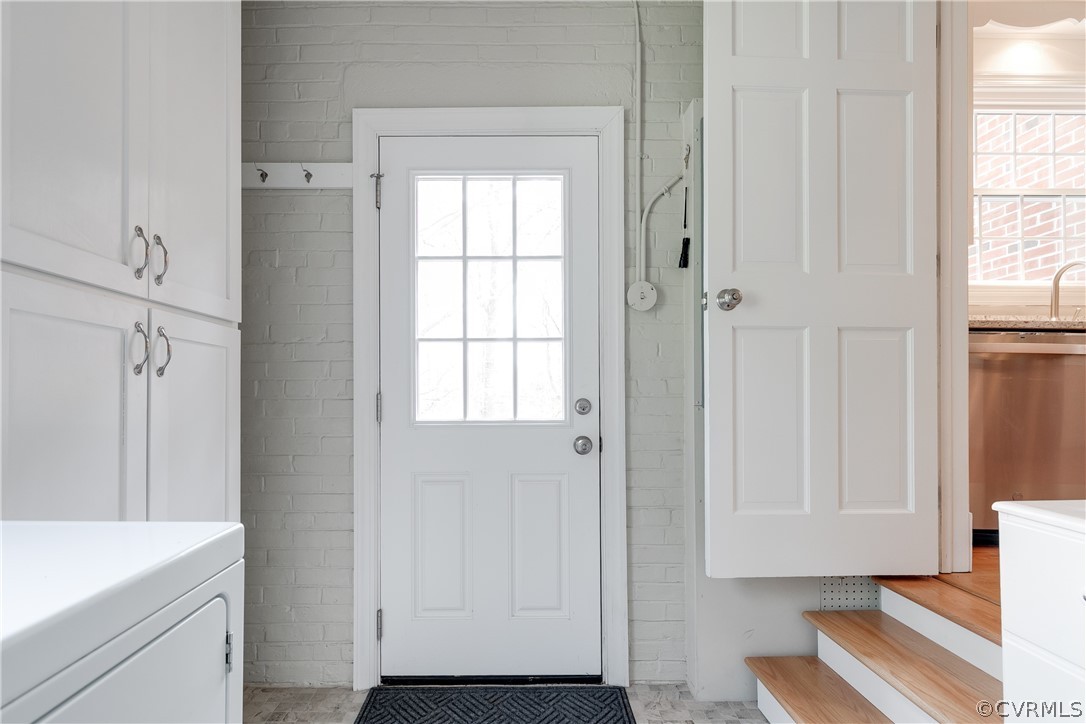 1015 Ridge Top Road Henrico, VA 23229 - Photo 14 of 50 Spacious laundry room with rear exterior door is an extension of the kitchen with great storage!