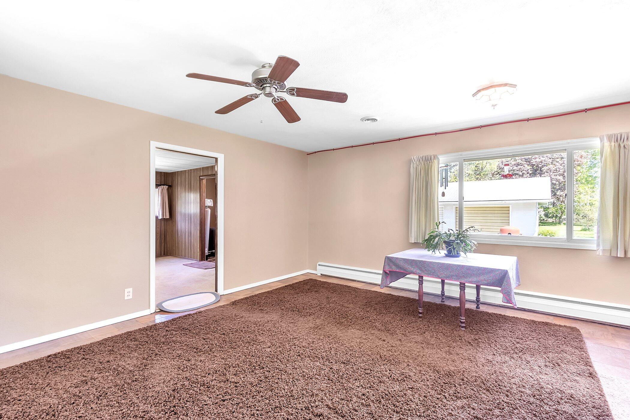 18967 Three Oaks Road Three Oaks, MI 49128 - Photo 13 of 36 living room/dining room