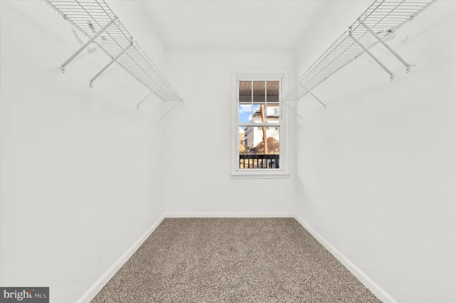 a bathroom with a double vanity sink mirror and shower