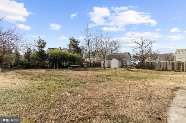 a view of a town with large trees