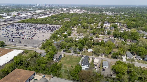 an aerial view of a city with lots of residential buildings