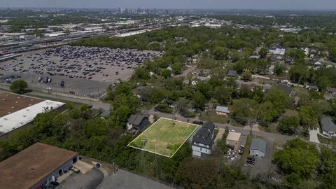 an aerial view of a city with lots of residential buildings