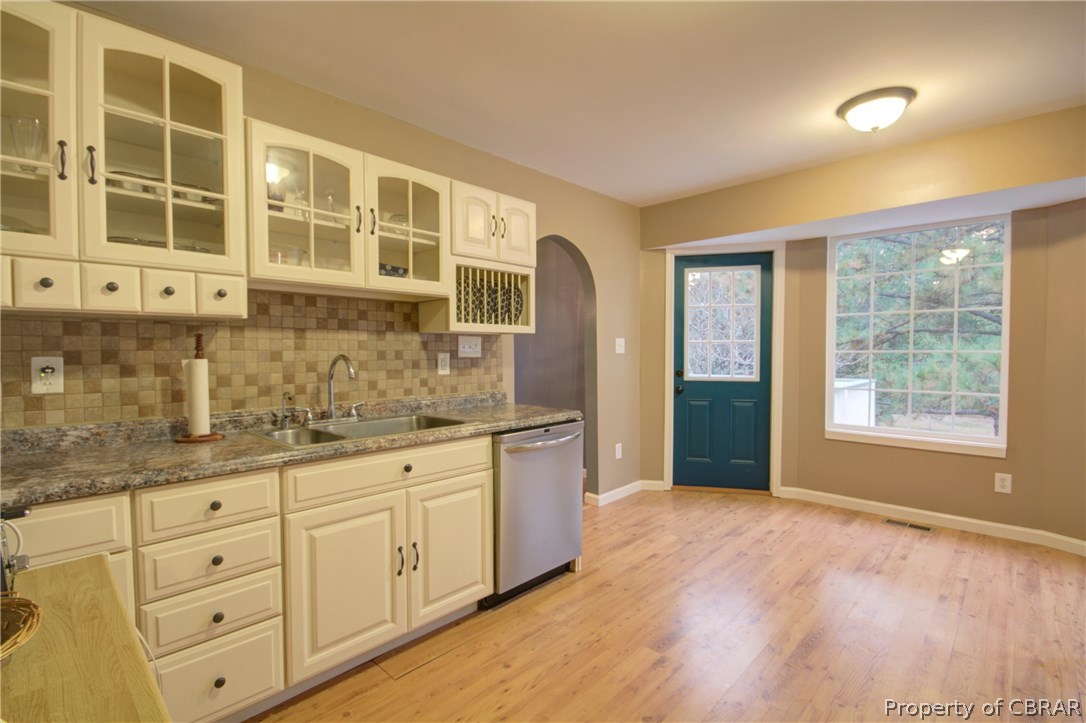8757 Glass Road Hayes, VA 23072 - Photo 14 of 34 Kitchen is connected to back deck. There is a pantry as well as more than ample cabinet space.