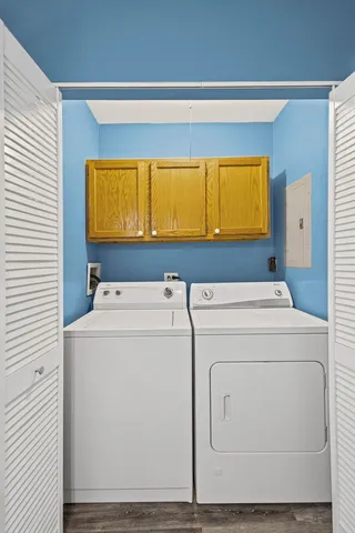 a utility room with dryer and washer