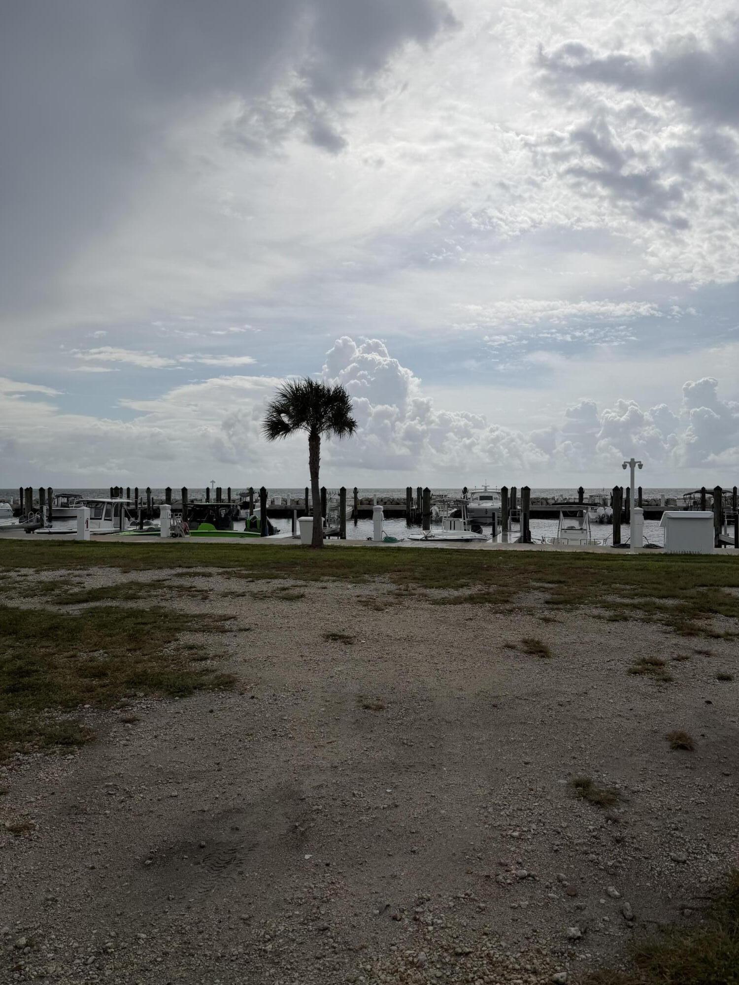 94825 Overseas Highway, Unit 8 Key Largo, FL 33037 - Photo 12 of 12 a view of an ocean with boats