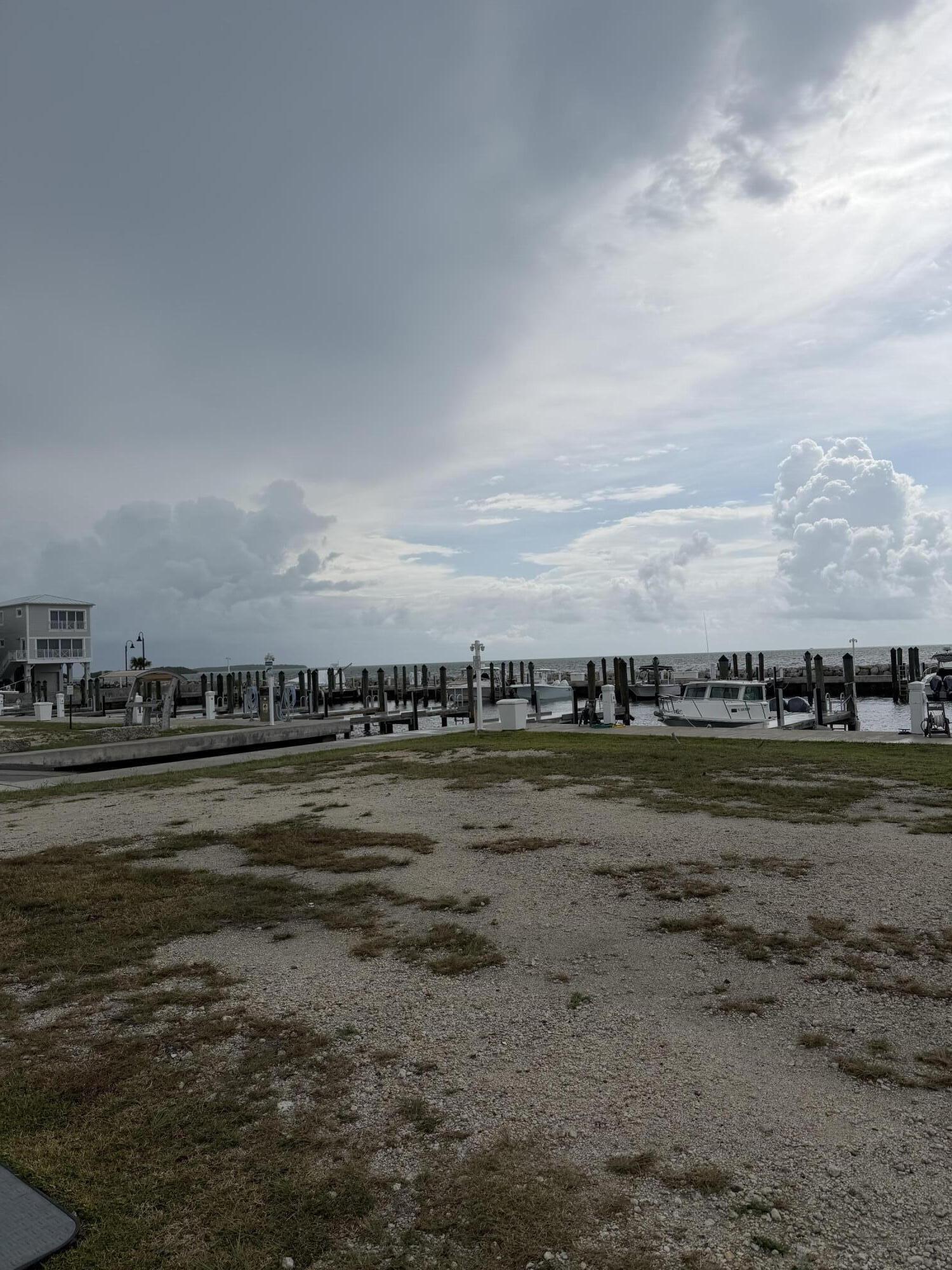 94825 Overseas Highway, Unit 8 Key Largo, FL 33037 - Photo 3 of 12 a view of a water with an ocean view
