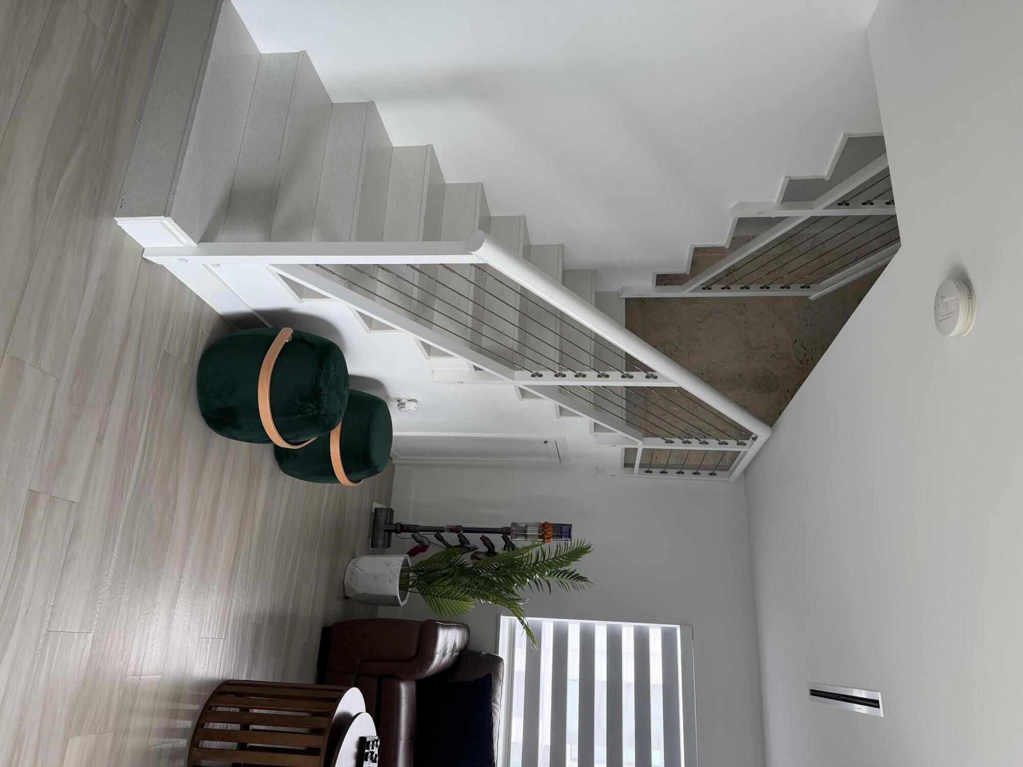 94825 Overseas Highway, Unit 8 Key Largo, FL 33037 - Photo 8 of 12 a view of entryway and hall with wooden floor