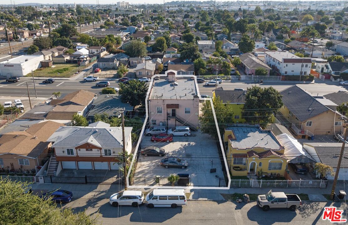 123 West Alondra Boulevard Compton, CA 90220 - Photo 4 of 5 an aerial view of multiple houses with a city view