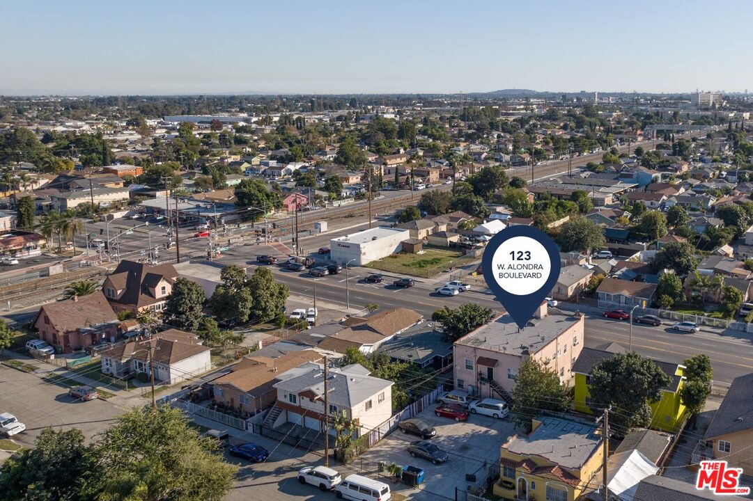 123 West Alondra Boulevard Compton, CA 90220 - Photo 5 of 5 an aerial view of a city with lots of residential buildings