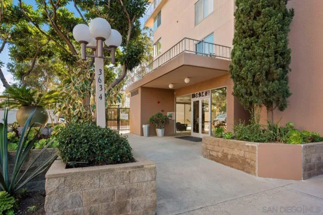a view of a chairs and table in the patio