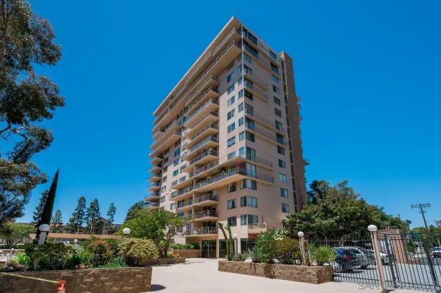 a swimming pool with outdoor seating and yard