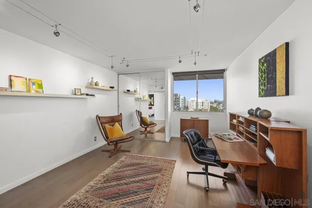 a workspace with wooden floor and a workspace