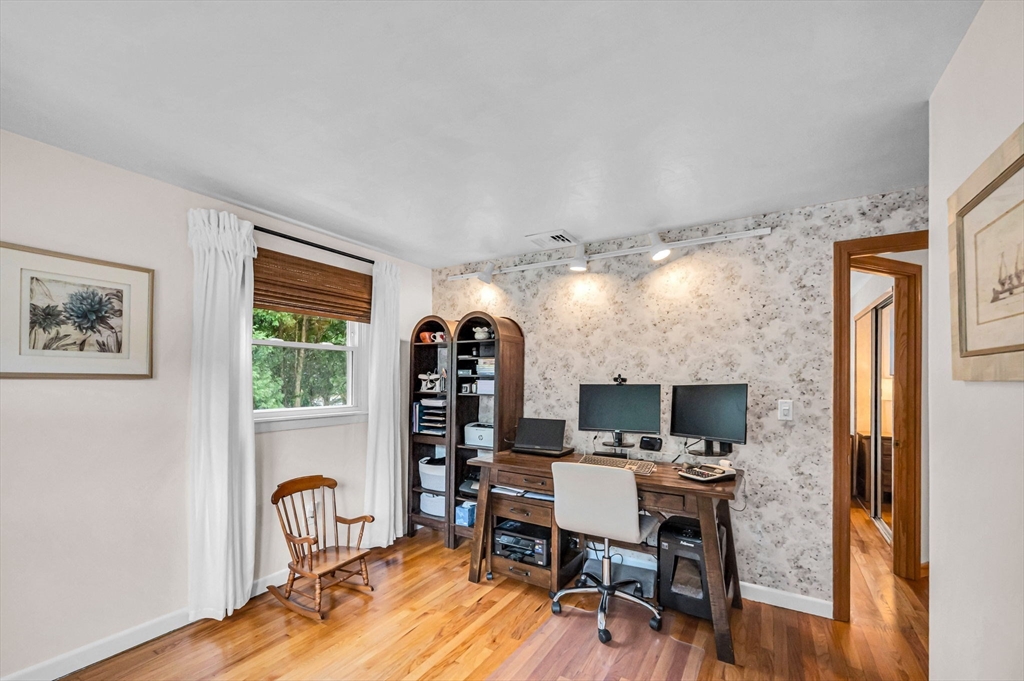 83 Loomis Drive Chicopee, MA 01020 - Photo 19 of 40 a view of a workspace with furniture and a window
