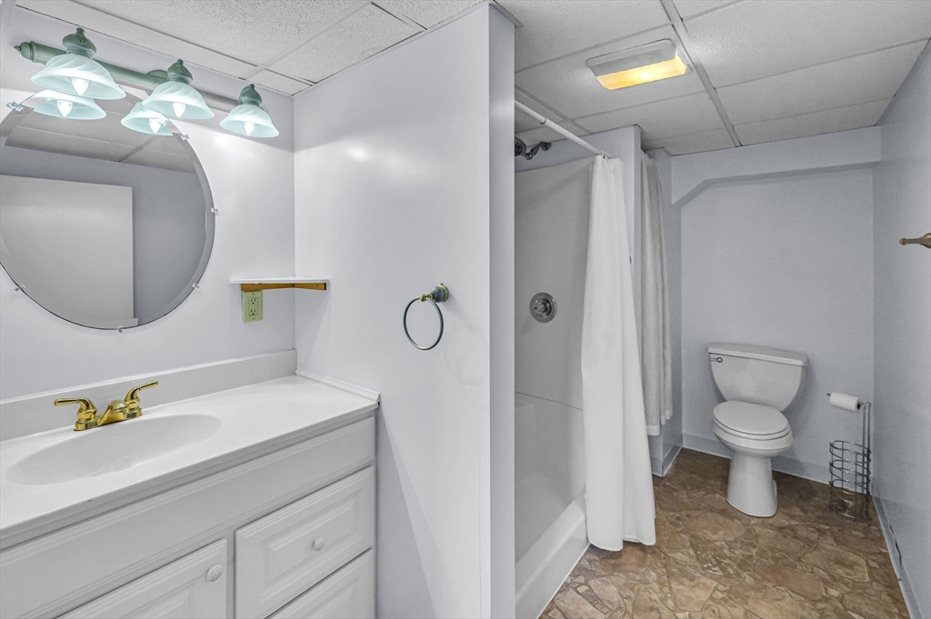 83 Loomis Drive Chicopee, MA 01020 - Photo 23 of 40 a bathroom with a sink toilet and shower