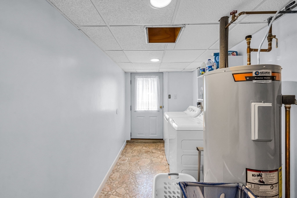 83 Loomis Drive Chicopee, MA 01020 - Photo 27 of 40 a bathroom with a sink and mirror
