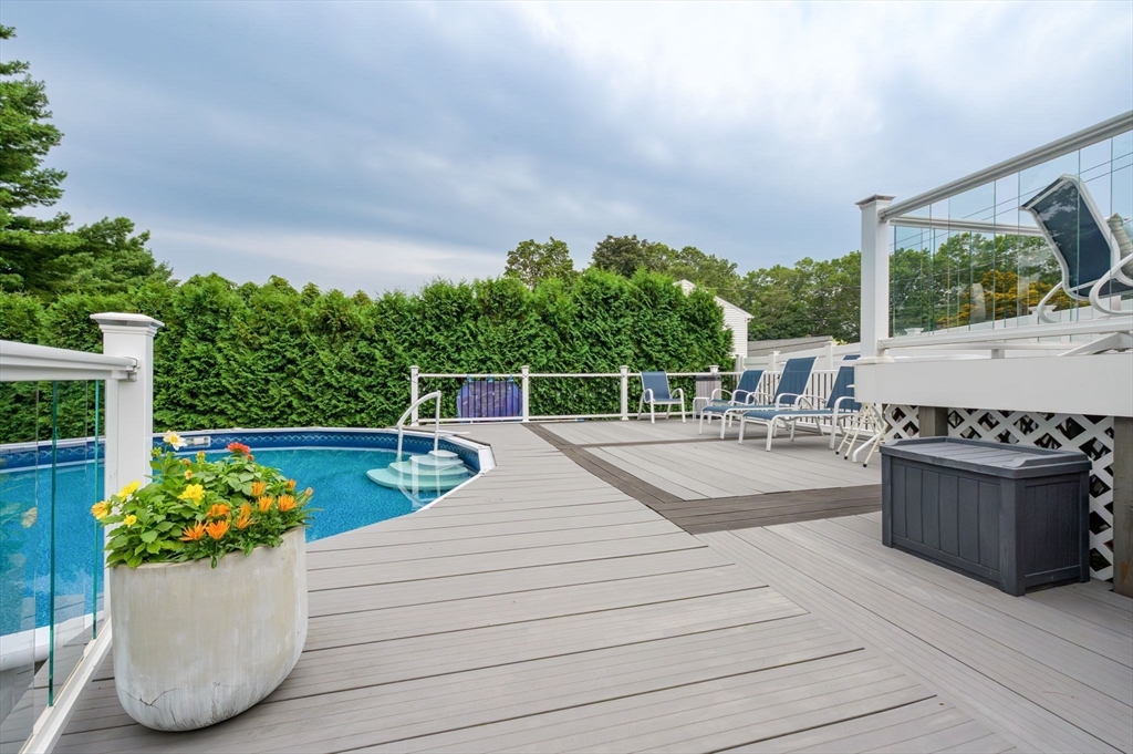 83 Loomis Drive Chicopee, MA 01020 - Photo 30 of 40 a view of a patio with couches and potted plants
