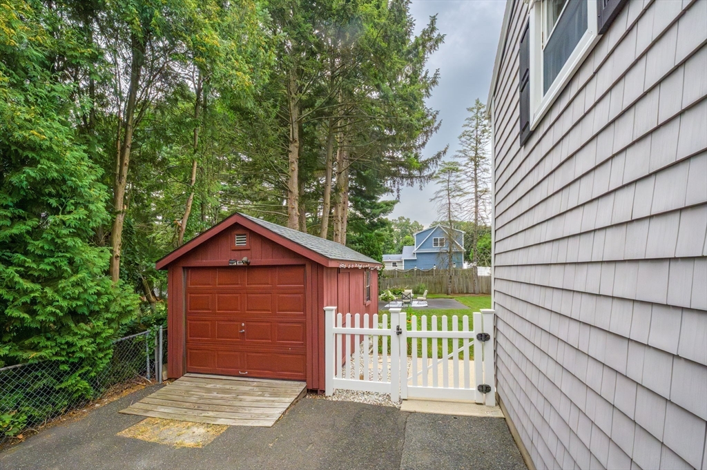 83 Loomis Drive Chicopee, MA 01020 - Photo 35 of 40 a front view of a house with a garage