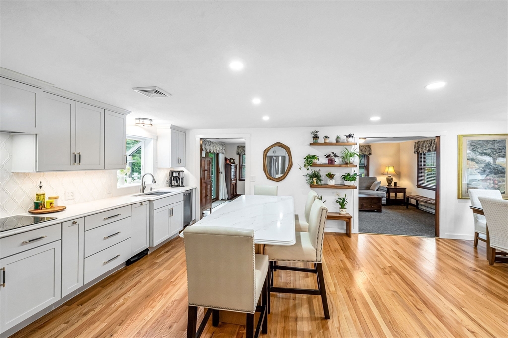 83 Loomis Drive Chicopee, MA 01020 - Photo 6 of 40 a view of a kitchen and dining room