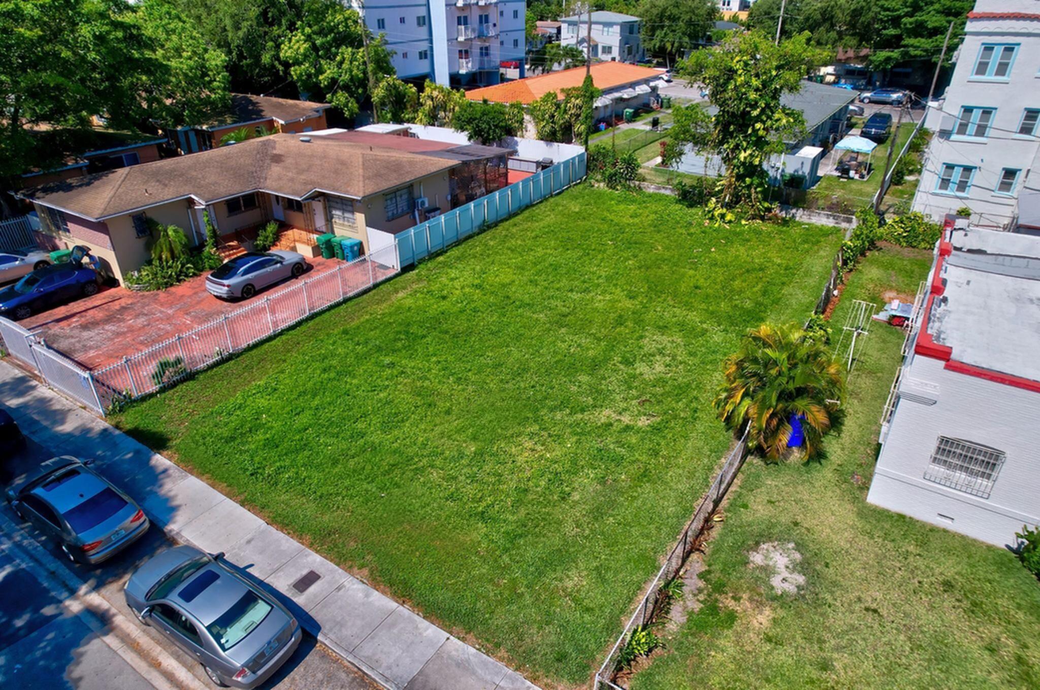 512 Southwest 6th Avenue Miami, FL 33130 - Photo 1 of 12 an aerial view of a house with a garden and swimming pool