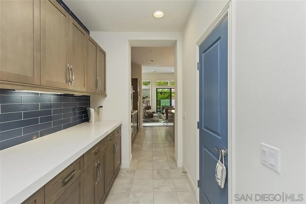 4702 Crespi Court Carlsbad, CA 92010 - Photo 12 of 39 a kitchen with sink and cabinets