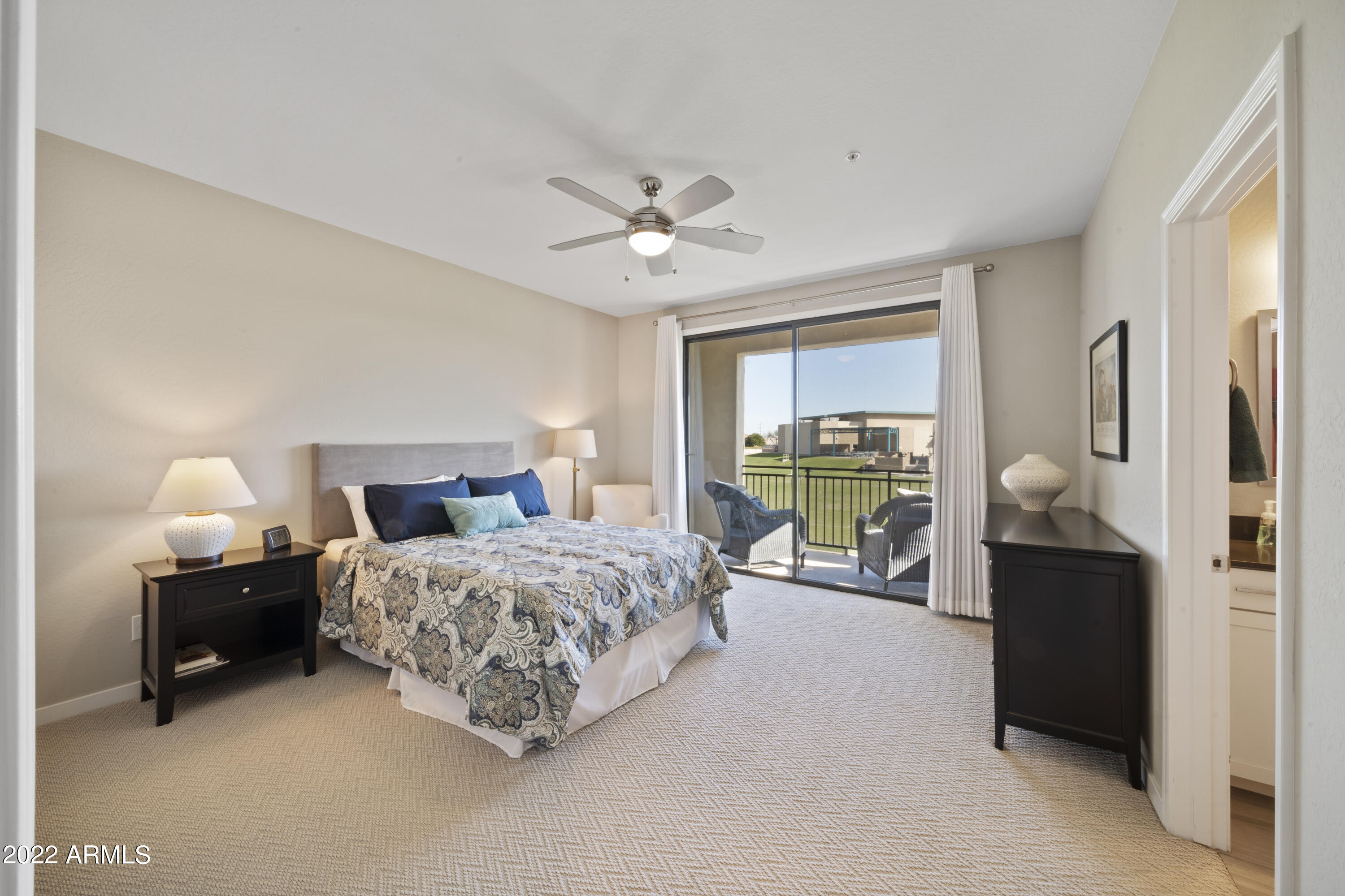 3900 East Baseline Road, Unit 147 Phoenix, AZ 85042 - Photo 17 of 35 Primary bedroom with private balcony