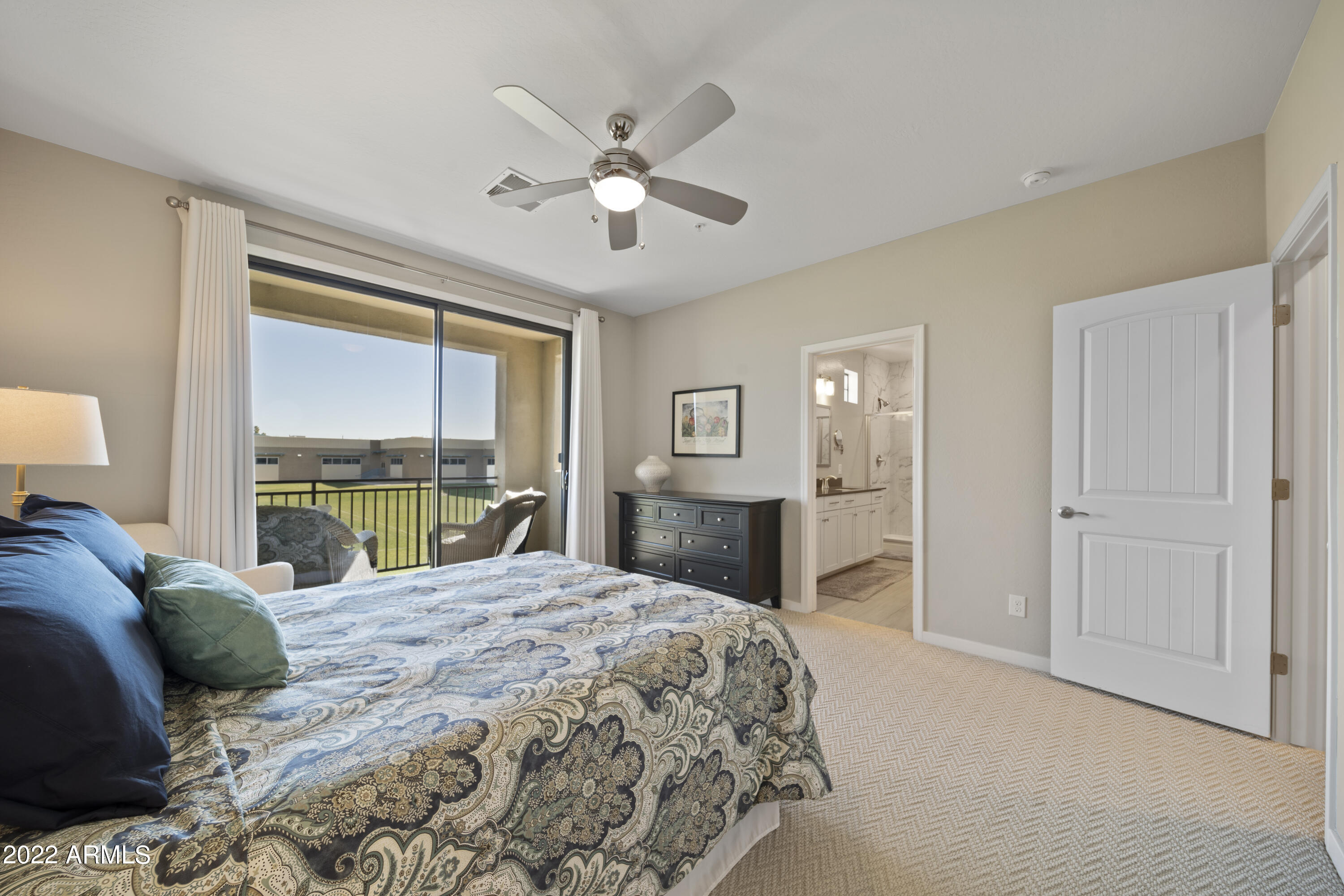 3900 East Baseline Road, Unit 147 Phoenix, AZ 85042 - Photo 3 of 35 Primary bedroom with en suite