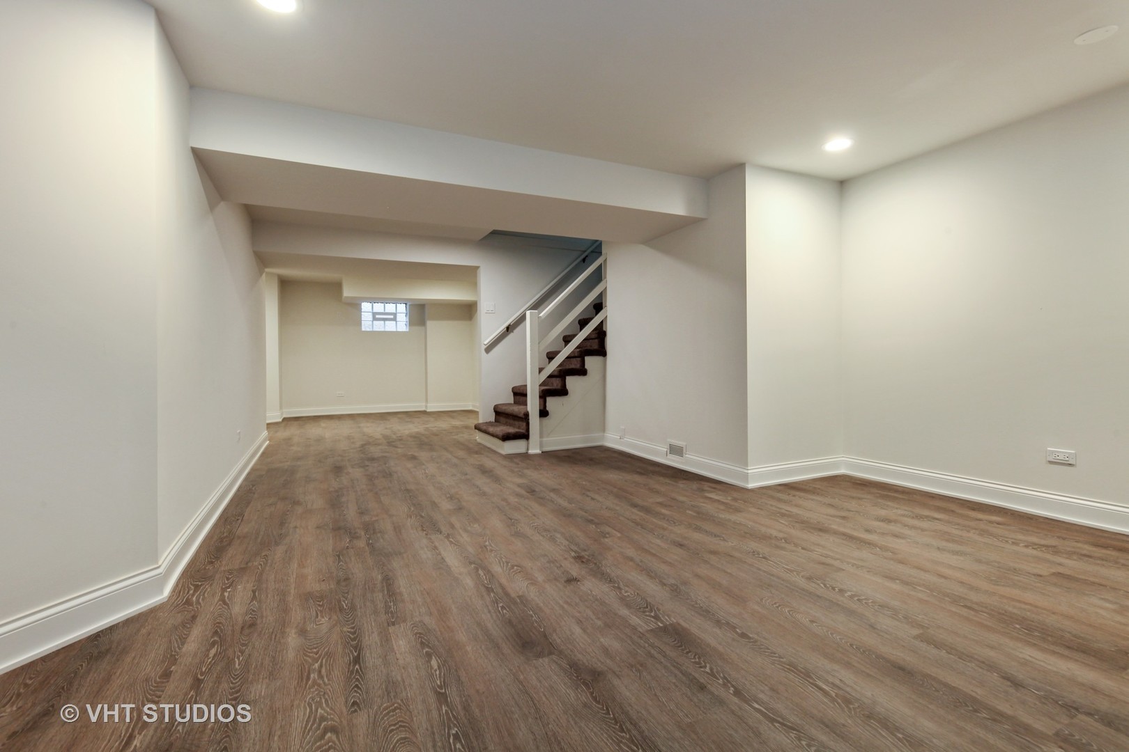 1729 Berkeley Road Highland Park, IL 60035 - Photo 20 of 25 wooden floor in an empty room with a window