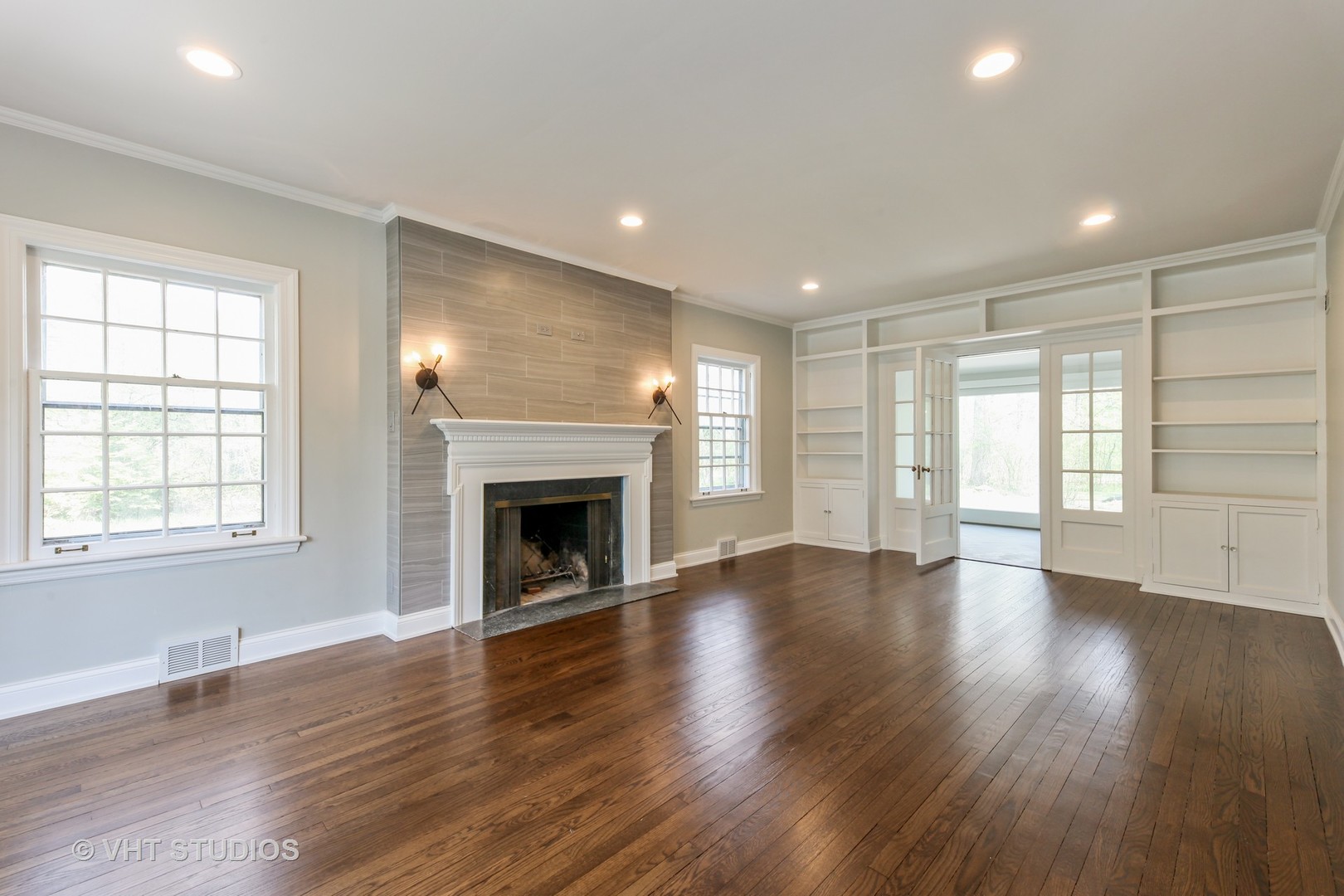 1729 Berkeley Road Highland Park, IL 60035 - Photo 9 of 25 a view of an empty room with wooden floor and a window