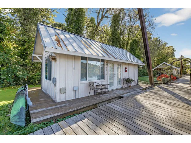 a view of house with wooden floor and outdoor space