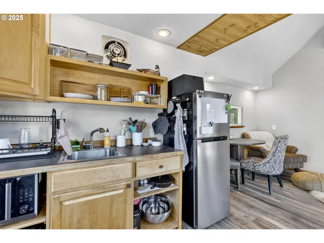 a room with furniture and wooden floor