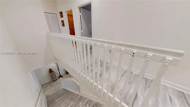 a view of entryway with wooden floor