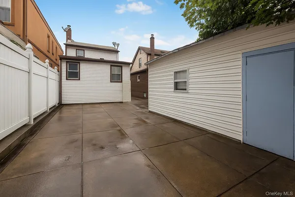 $899,000 | 90-06 107th Avenue | Liberty Heights Ward