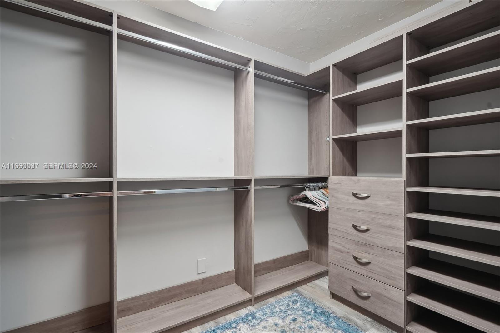 1164 Southwest 14th Street Boca Raton, FL 33486 - Photo 28 of 54 Custom walk-in closet in main suite