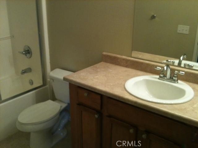 38726 4th Palmdale, CA 93550 - Photo 7 of 7 a bathroom with a sink a toilet and shower
