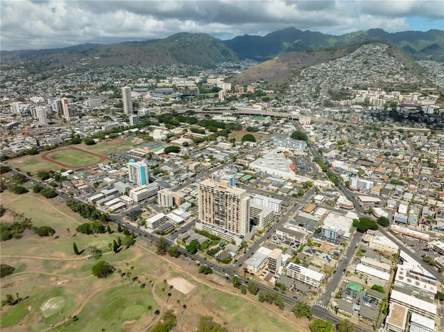 a view of residential houses with outdoor space