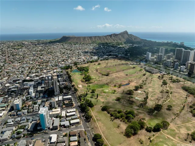 a kitchen with a refrigerator stove and sink