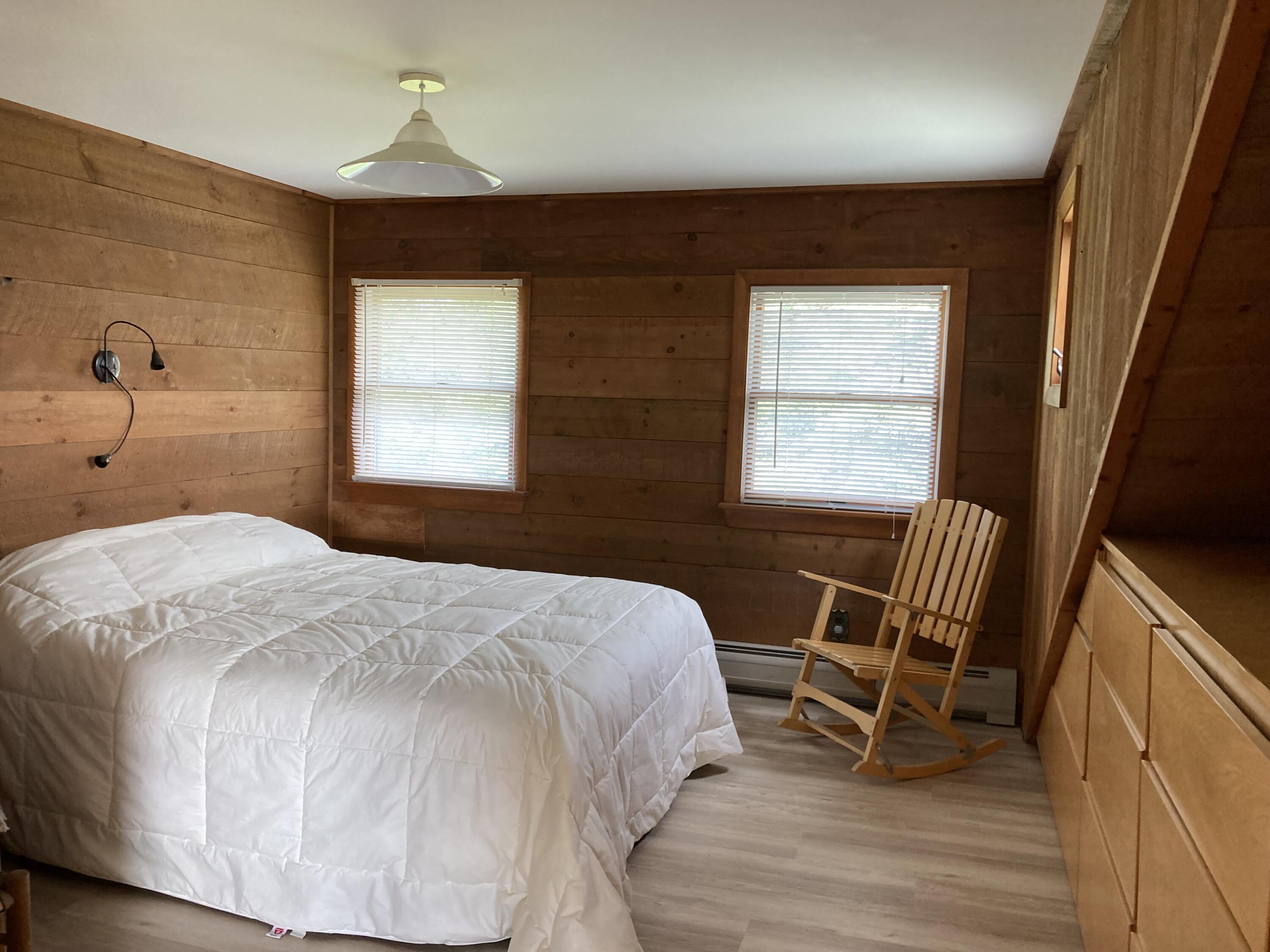 68 Crowley Island Road Corea, ME 04624 - Photo 18 of 24 Master bedroom with built-ins.