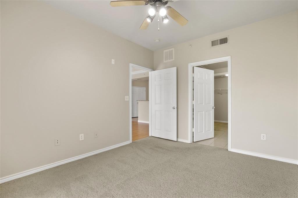 3102 Kings Road, Unit 1303 Dallas, TX 75219 - Photo 13 of 25 an empty room with a bathroom