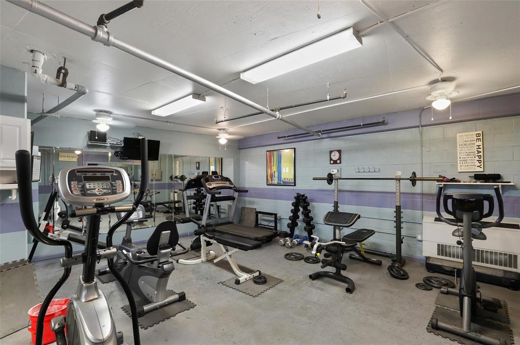 3102 Kings Road, Unit 1303 Dallas, TX 75219 - Photo 24 of 25 a view of a room with gym equipment