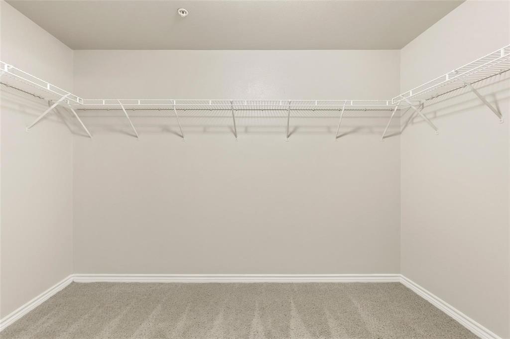 3102 Kings Road, Unit 1303 Dallas, TX 75219 - Photo 10 of 25 a view of an empty walk in closet